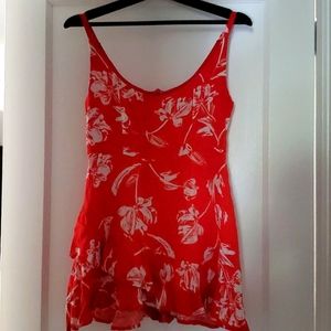 Lightly wear Romper. Dress up or down with flats or heels.